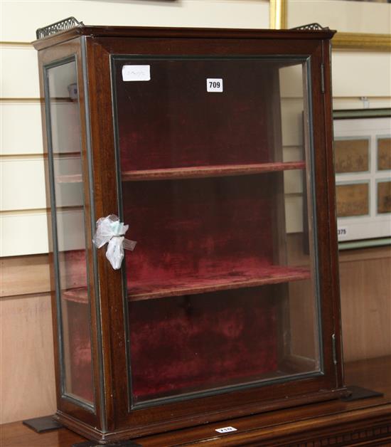 A mahogany wall mounting china display cabinet